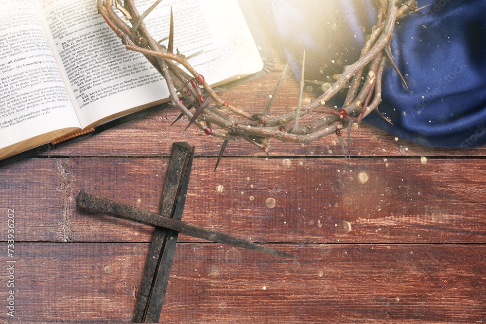 Wall mural crown of thorns on holy bible with flower. easter concept.