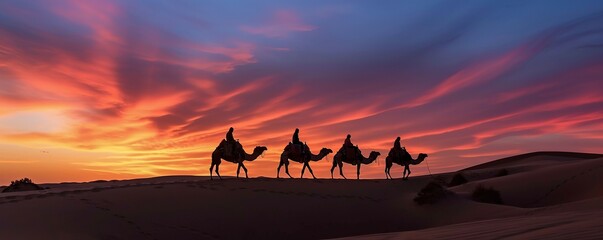 Desert landscape at sunset on a sunny afternoon with camels running