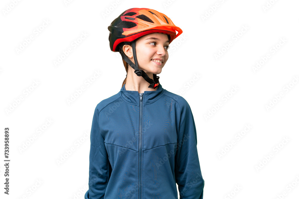 Poster Teenager cyclist girl over isolated chroma key background looking side