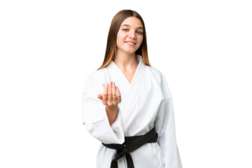 Teenager girl doing karate over isolated chroma key background inviting to come with hand. Happy that you came