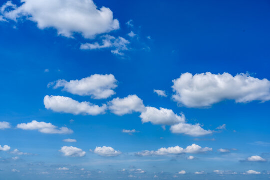 beautiful white clouds with blue sky on background