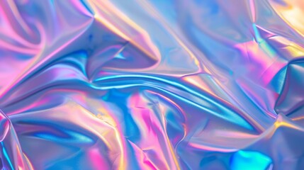 Blurred Holography abstract background in blue pink colors. Holographic color wrinkled pearlescent foil. Holographic iridescent rainbow fabric abstract background