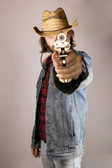 Cowboy aiming revolver