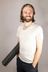 Man preparing for yoga practice