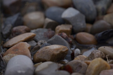 Macro of pile of multicoloured pebbles
