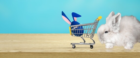 Easter bunny cute rabbit with classic shopping cart