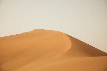 Crescent Moon Spring in Mingsha Mountain, Dunhuang City, Gansu Province - Desert scenery under a clear sky © 江乐 陈