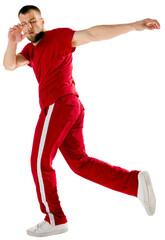 Full-length portrait of young sportive man performing dance, hip-hop, breakdance elements in motion...