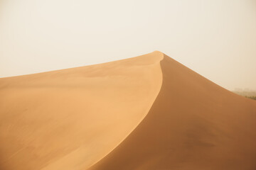 Crescent Moon Spring in Mingsha Mountain, Dunhuang City, Gansu Province - Desert scenery under a clear sky