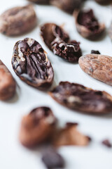Closeup cocoa roasted beans. Shallow dof