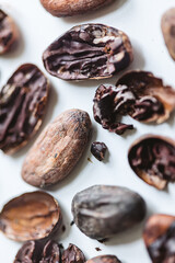 Closeup cocoa roasted beans. Shallow dof
