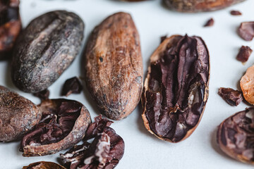 Closeup cocoa roasted beans. Shallow dof