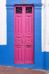 Colorful wooden door in the historic center of Bogota Colombia