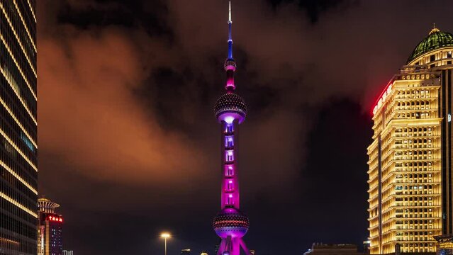 Oriental Pearl tower close-up view time lapse in Pudong, Shanghai, China.
