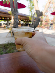 Dirty coffee cup or espresso coffee with milk