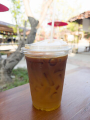 Iced americano black coffee mix of orange juice