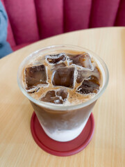 Dirty coffee cup or espresso coffee with milk