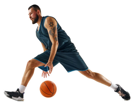 Dynamic shot capturing skilled basketball player in action, focused and determined during intense training session against transparent background. Concept of sport, hobby, active lifestyle.