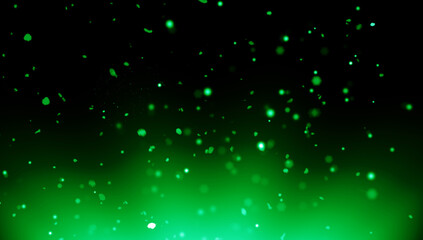 Blurred green fire embers sparks on black background . Texture isolated overlays. Concept of particles, sparkles, flame and light.