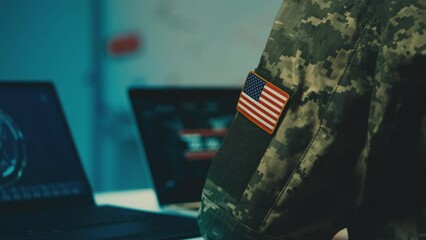 USA military officer working in office, countdown to launch of ground operation