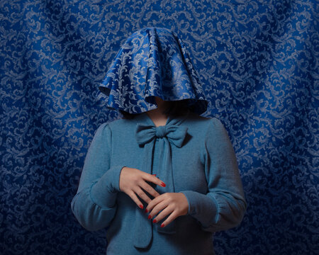 Woman hiding blue
