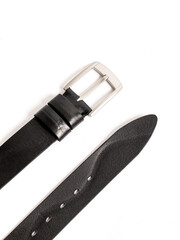 Genuine leather belt on white background. The end of the belt with holes