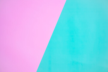 abstract pastel pink and green paper texture background. colorful geometric two tone paper background with copy space.