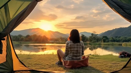 Gordijnen Asian woman travel and camping alone at natural park © kanesuan