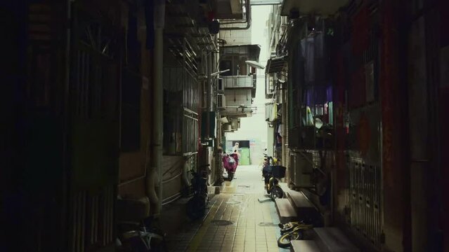 Narrow alley in residential community in Shenzhenin Guangdong, China, Asia.