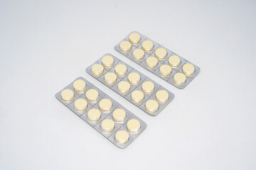 tablet medicine for pain on a white background