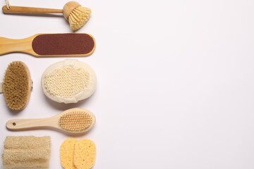 Bath accessories. Flat lay composition with personal care tools on white background, space for text