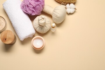 Bath accessories. Flat lay composition with personal care products on beige background, space for text