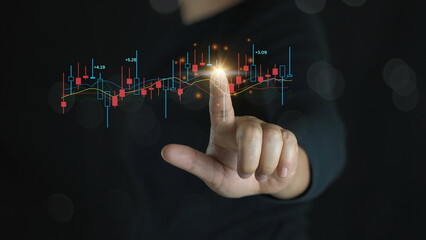 Hand of Businessman or trader is showing a growing virtual hologram stock on smartphone, planning and strategy, Stock market, Business growth, progress or success concept. invest in trading.