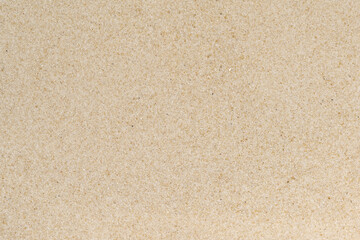 Fototapeta na wymiar Clean quartz sand background. fine sand fraction texture. sand close-up top view