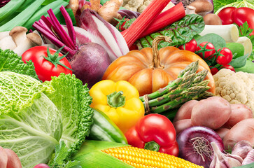 Plenty of fresh organic vegetables and herbs close-up. Food background.