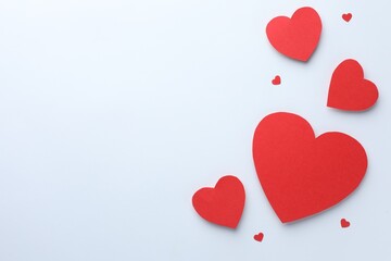 Paper hearts on white background, flat lay. Space for text