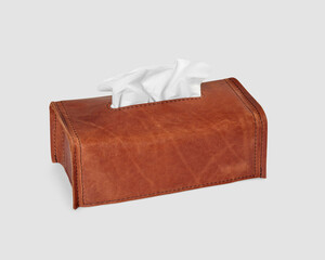 Brown leather tissue box cover decorated with embossed letters