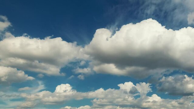 Timelapsing view of beautiful blue sky with clouds.