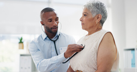 Stethoscope, examination and doctor with senior woman at hospital for lungs, chest or breathing...