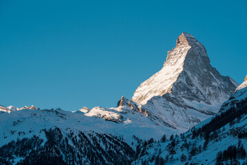 matterhorn with snow covered mountains in winter in switzerland