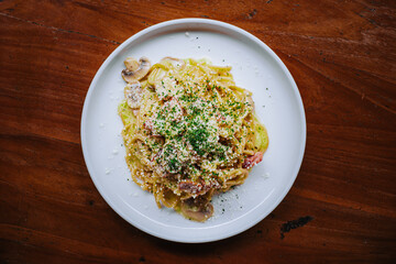 Spaghetti Carbonara with mushroom and meat