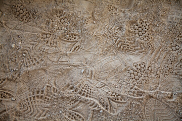 Several dozens of shoe prints