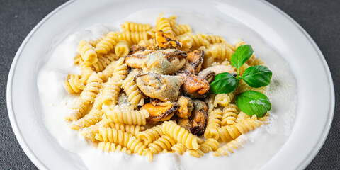 fusilli pasta with mussels seafood Mediterranean cuisine tasty fresh eating cooking appetizer meal...