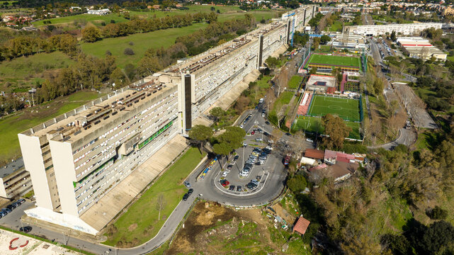 Aerial view of Nuovo Corviale known as "il Serpentone" (the great snake) due to its length. It is a residential complex in Rome, Italy, located in the south-western outskirts of the capital.
