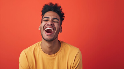 Obraz premium Latin American Man Radiating Happiness and Joy, Isolated on Solid Background - Copy Space Included