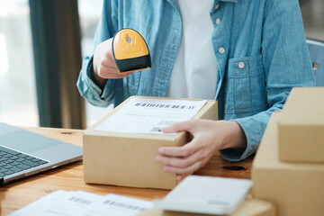 Scanning Barcode on Shipping Box with Scanner