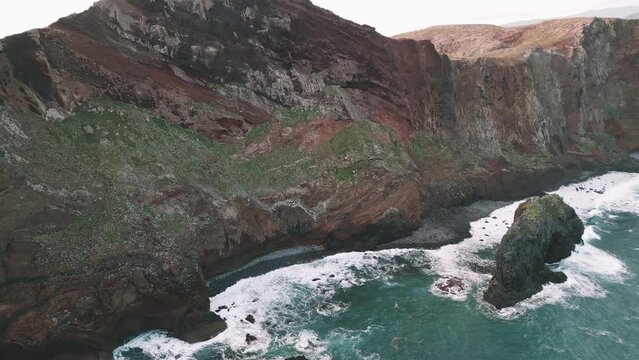 Aerial flight at the spectacular Vereda da Ponta de  Sao Lourenco Hike, Madeira, Portugal with a drone doing a rotating motion and a pan