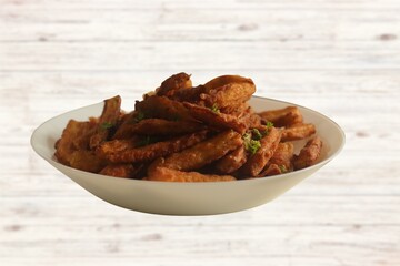 Top view of a plate of corn fritters.Perkedel Jagung or Bakwan Jagung. Corn fritters is Indonesian traditional food. Savory snack made of corn, flour, spring onion, and salt. Vegetarian food,Thai food