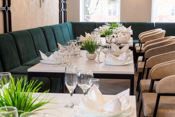 Modern interior of urban restaurant or cafe with dining places.