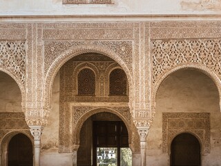 Arcades of carved marble stone Alhambra, Granada, Andalusia, Spain